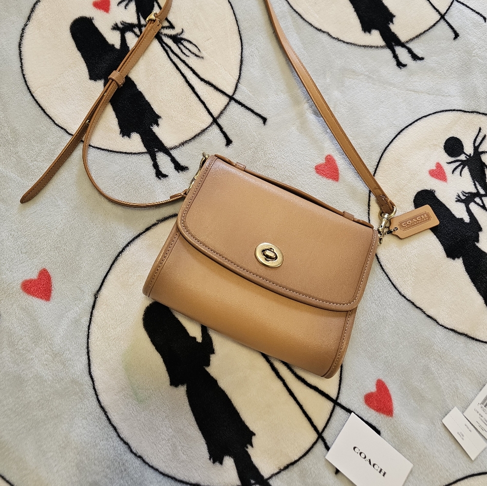 Coach Kip Turnlock crossbody bag.